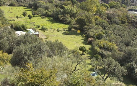 Villa, pool & grounds from distance in late Spring